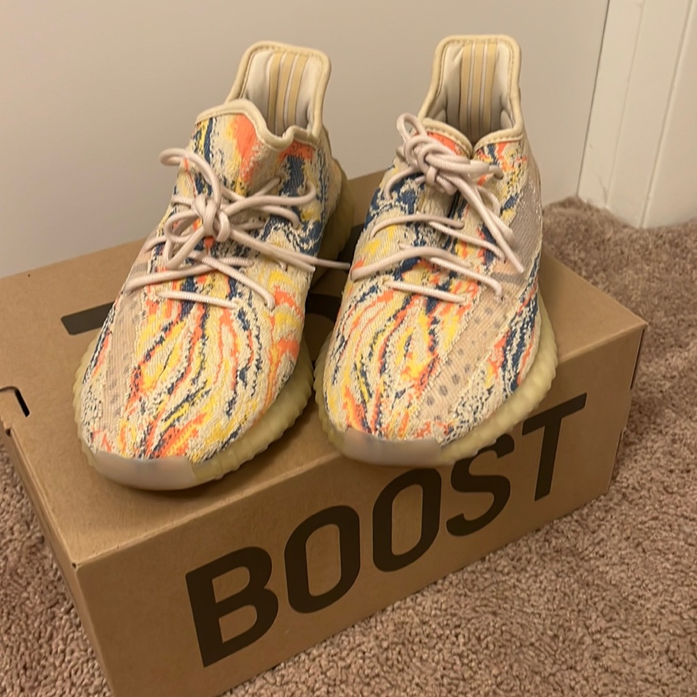 Selling a pair of Rainbow Yeezy sneakers. Size Women’s 10